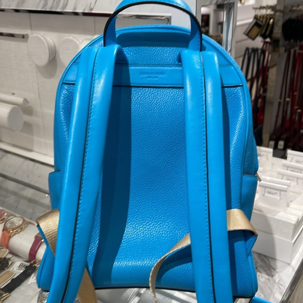 Michael Kors Bex Medium Pebbled Leather Backpack
COLOR SANTORINI BLUE
NWT - Picture 15 of 16